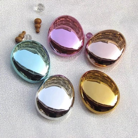 Oval lens case gold